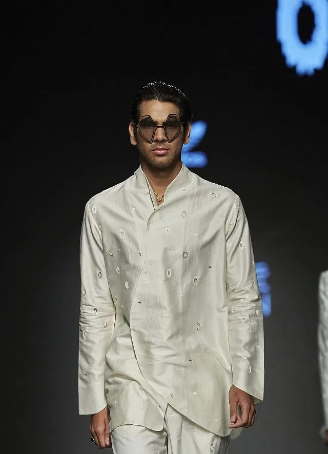 Designers like Ujjawal Dubey have reimagined this classic piece of clothing in lighter fabrics and edgier cuts  Apoorv Maurya