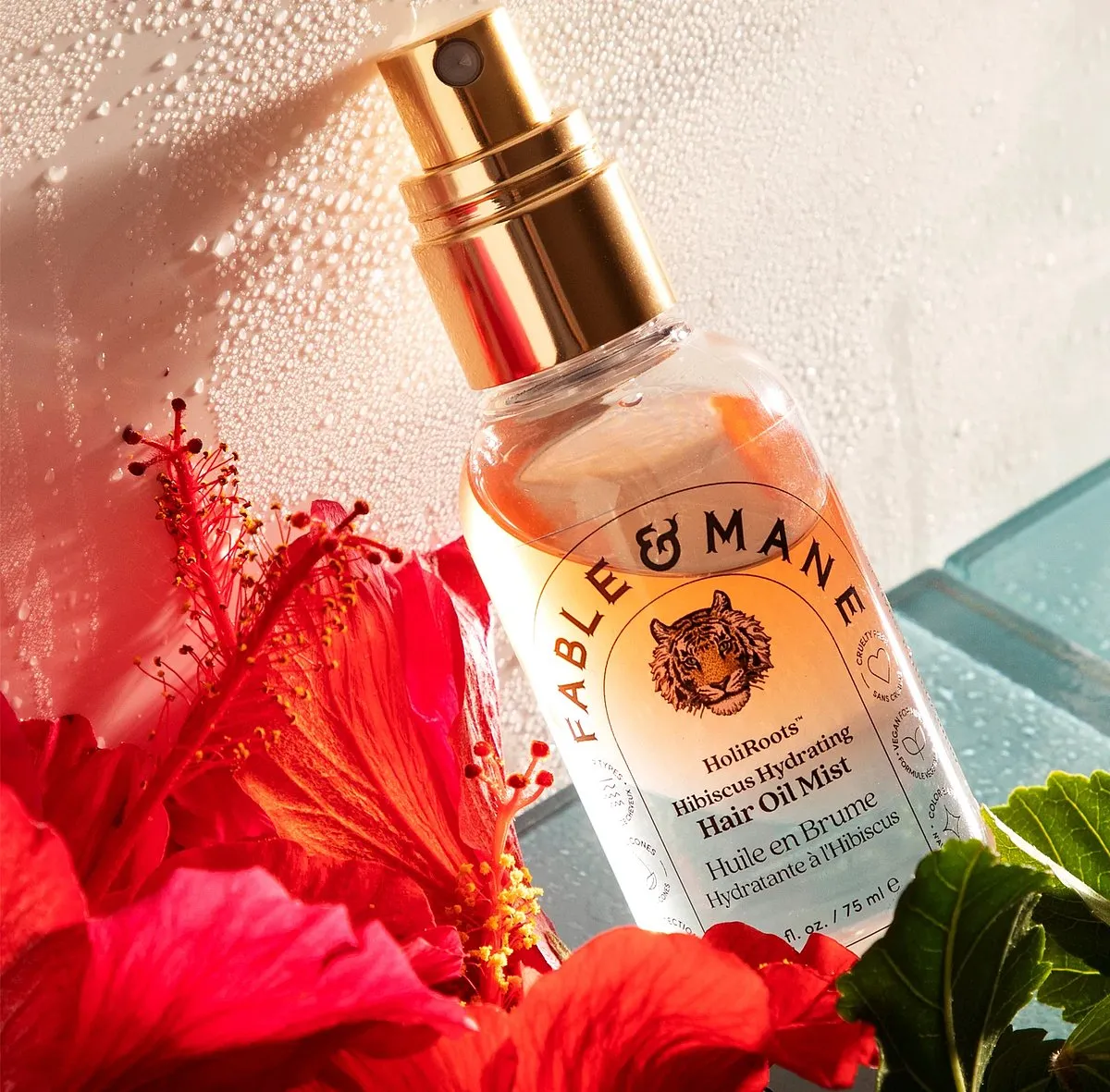 Fable and Mane HoliRoots™ Hibiscus Hydrating Hair Oil Mist₹ 2,405Shop hereThis super nourishing bi-phase hair mist is enriched with antioxidants and red hibiscus—just shake it well and mist it on dry hair to leave it feeling soft to the touch and bouncier than before. It has squalane too, a lightweight hydrator that tamps all the frizz down. 