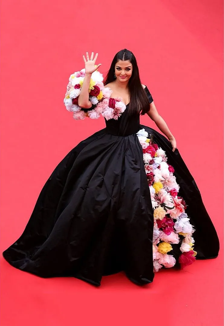 Aishwarya Rai Bachchan marked 20 years at the Cannes film festival in 2022,   but she was criticised for her Dolce & Gabbana gown with 3D floral motifs and was likened to a big bouquet or an ornate cake 