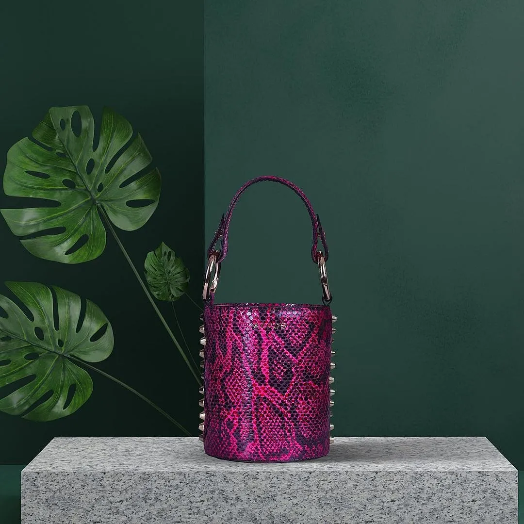 KaerosCo-founded by Kritika Aggarwal Gupta and Shreeda Chakraborty in 2018, Kaeros puts a statement spin on staple silhouettes such as bucket bags, totes and top handles by adding high-wattage hues, shiny studs and python prints to the mix. For those who love accessorising their accessories, the brand also offers a fun range of chain straps, initial charms and flaps. Kaeros.co 