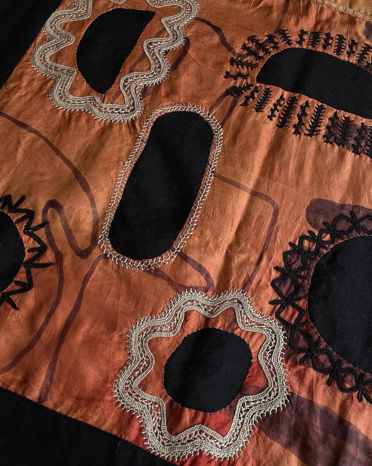 ‘Desert at Dusk’, inspired by the Rabari embroidery style. The base fabric here is of mulberry silk hand-painted and naturally dyed with madder 