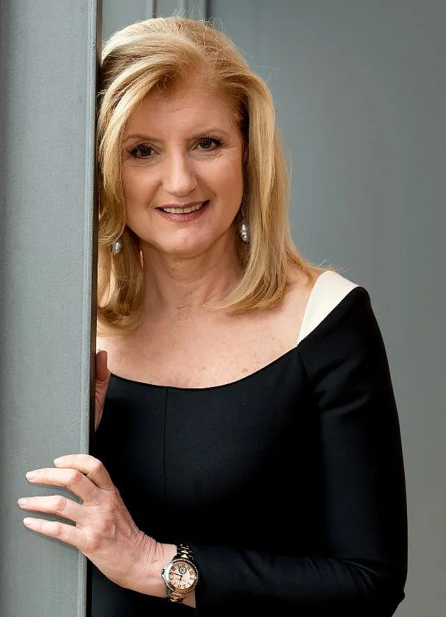 Arianna Huffington's sartorial strategy lies in  versatile, long-sleeved dresses  