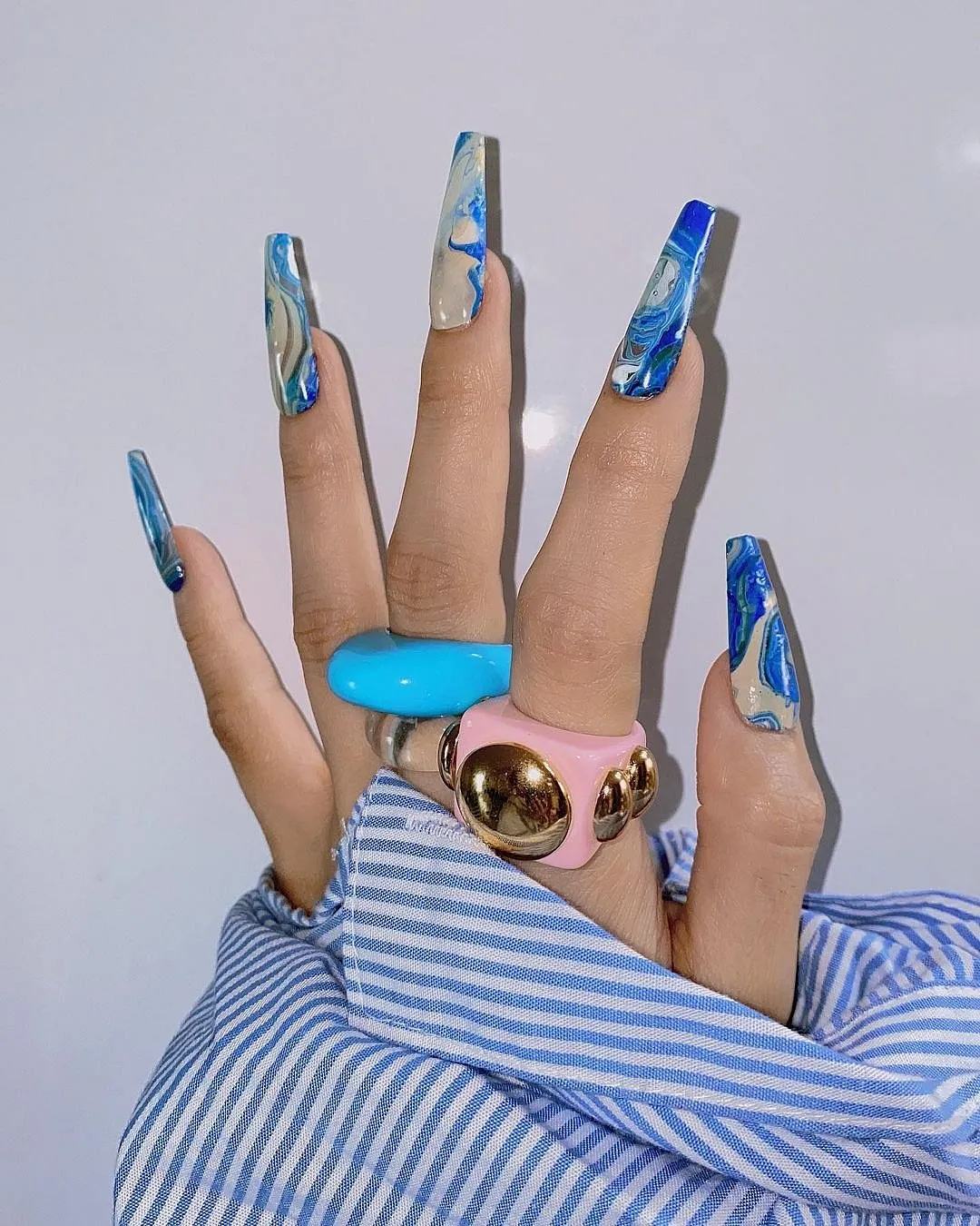 Park Eunkyung (@nail_unistella)Some nail artists do a great job at executing the trends you love, but then some—like Park Eunkyung— create the trends in the first place. The South Korean artist is known for shattered-glass manicures, wire manicures and negative-space manicures, especially as she does them on her famous clients like Blackpink, Gigi Hadid and Cara Delevigne. Follow her if you’re looking for dramatic nail art inspiration for a major event. 