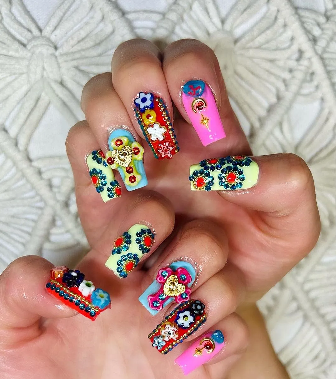 Britney Tokyo (@britneytokyo)For Britney Tokyo, more truly is more. She’s created looks you’ve probably bookmarked, such as Harry Styles’ fruit manicure, Rita Ora’s hole-punch design and Kim Kardashian’s kimoji tips. She’s tried everything, but bejewelled coffin nails with a different design on each nail is her favourite—everything is over the top, and each design is cooler than the ones you’ve tried earlier. 