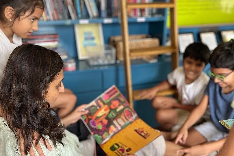 Reading out loud to your child is truly the cornerstone of helping them become a reader 