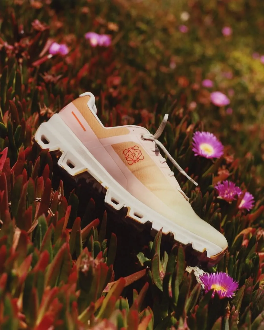 Loewe x On:Jonathan Anderson’s first teased his collaboration with On at Loewe’s Fall/Winter 2022 show in March, marking On's first venture into the luxury world. The six-piece capsule collection includes a T-shirt, jacket, trousers and leggings–each using the Swiss performance brand’s futuristic technology. But the main focus of this collaboration, of course, was on sneakers. Ideal for running, exercising and hiking, Anderson gave On’s Cloudventure and Cloudrock performance sneakers his own twist which featured lightweight cushioned soles, precision grip and recycled materials.Available on: Loewe.com 