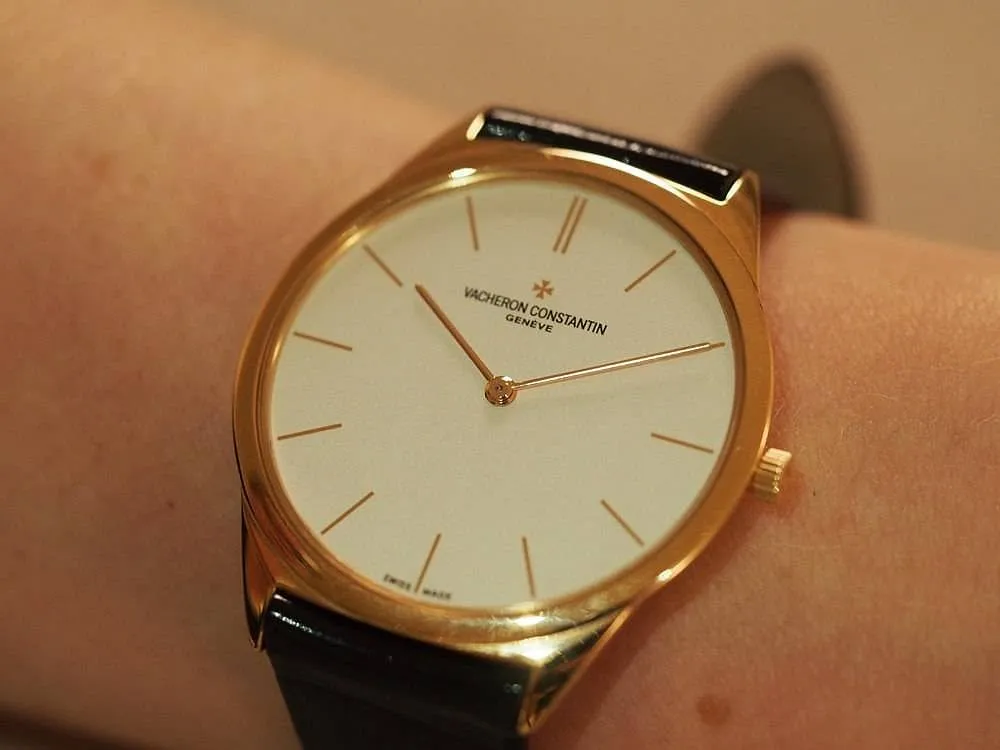 Vacheron Constantin Historiques Ultra-fine 1955:When this watch was launched in 2010, it was the thinnest mechanical watch on the planet, at 4.12mm. Other brands have shot past it since, but it’s still an achingly beautiful watch–and splendidly minimalistic. The in-house calibre 1003 hand-winder is a marvel, too–at just 1.3mm–and was first released back in the mid-1950s. The white dial makes the blue hour markers stand out, and the navy alligator strap adds a tasteful touch. 