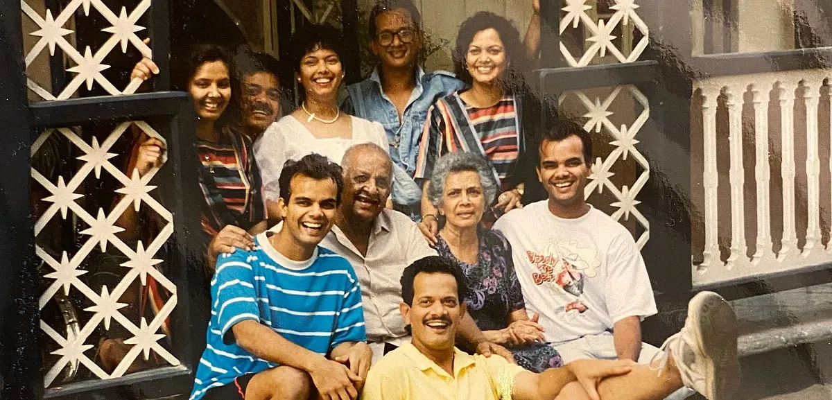 The Ferreira family outside 47G, the home they all grew up in.   