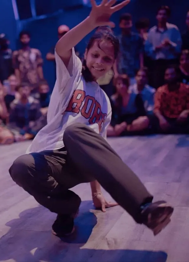 Siddhi Tambe, 18, aka B-Girl Bar-B’s introduction to breaking happened through her dance-loving mother when she was enrolled by her in dancing classes at the age of 10. 