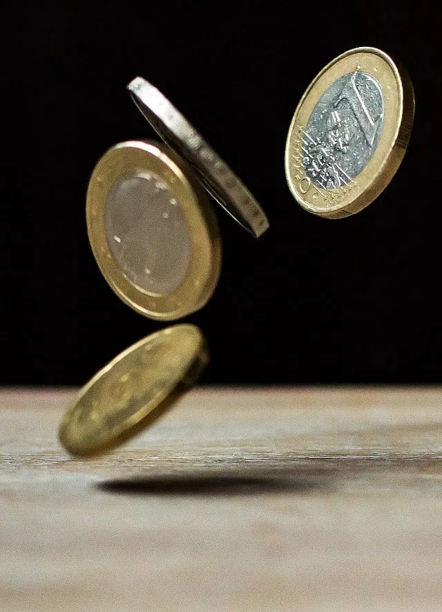 A mutual fund  pools together money from many investors and invests the corpus into  securities like bonds, stocks and gold. Image: Pexels 