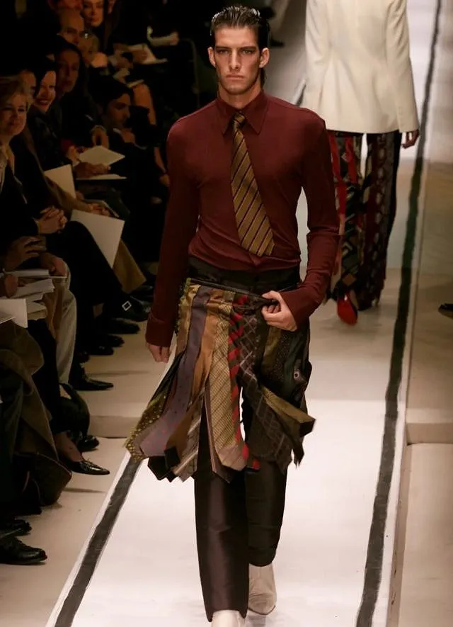 Jean-Paul Gaultier showcased men wearing skirts  in his 2002 couture collection. Image: Vogue.com 