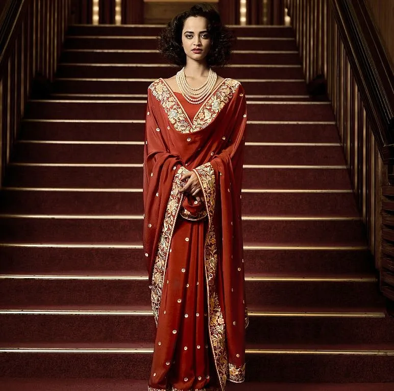 As a nod to his heritage, the designer created a line of classic gara saris, with elegant borders in a gem-stone inspired colour palette 