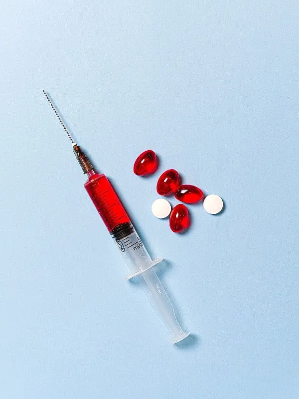 During the AIDs epidemic, big  pharmaceutical companies purposefully neglected the queer population, consigning them to the murky sidelines. Image: Pexels 