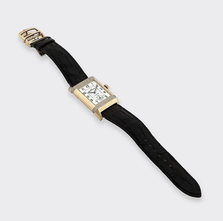 The 'Reverse Duoface' gold wristwatch comes with a self-winding movement and a white dial has Arabic numerals as the hour markers and rose gold baton hands with a 24-hour sub-dial 