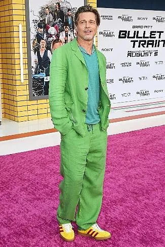 Brad Pitt's relaxed, linen suit set is a breath of fresh air on the red carpet. Image: Instagram.com/gq 