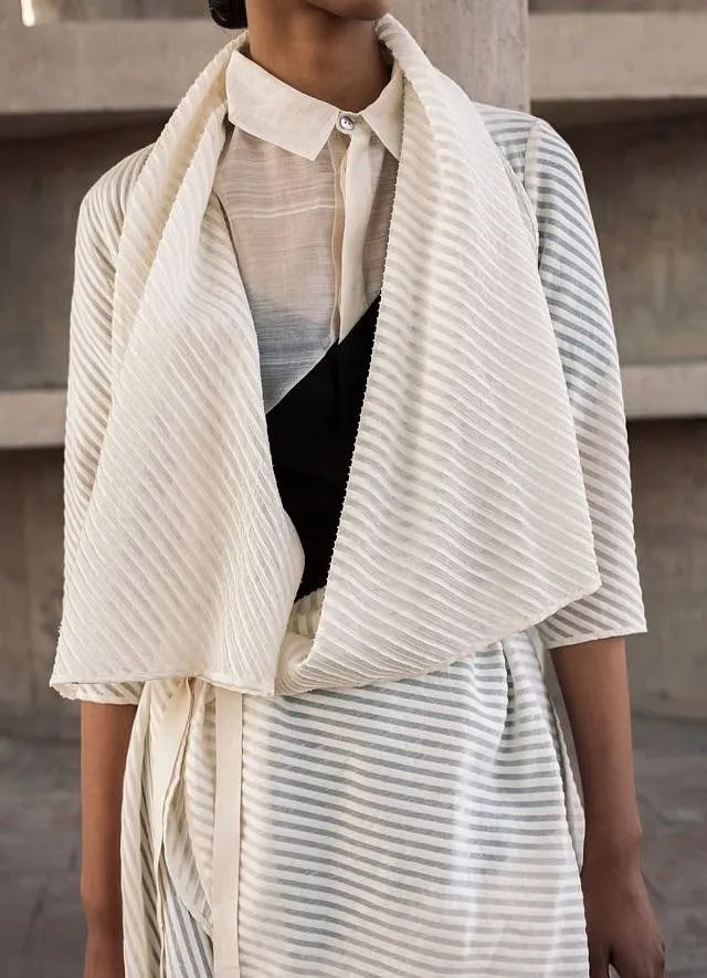 The 'Opaco Shirt' and the 'Variable Jacket' features linear textures in the form of pin tucks  