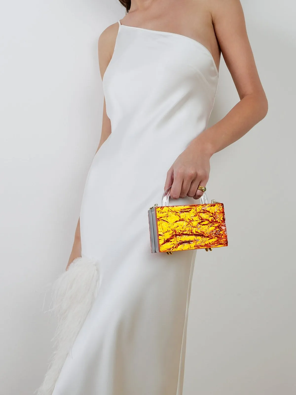 L’AfsharFrom Kylie Jenner to Bella Hadid, and Celine Dion to Anne Hathaway, L’Afshar is a Dubai-based handbag label coveted by stylish celebrities globally. Founded by British-Iranian Lillian Afshar, the brand is known for its signature translucent box clutches that are both bold and timeless. Her popular ‘Eva’ bags are crafted from transparent acrylic and come in a crushed-ice finish or a quilted finish—both of which instantly stand out, as do their unique geometric shapes and colours.Shop here 
