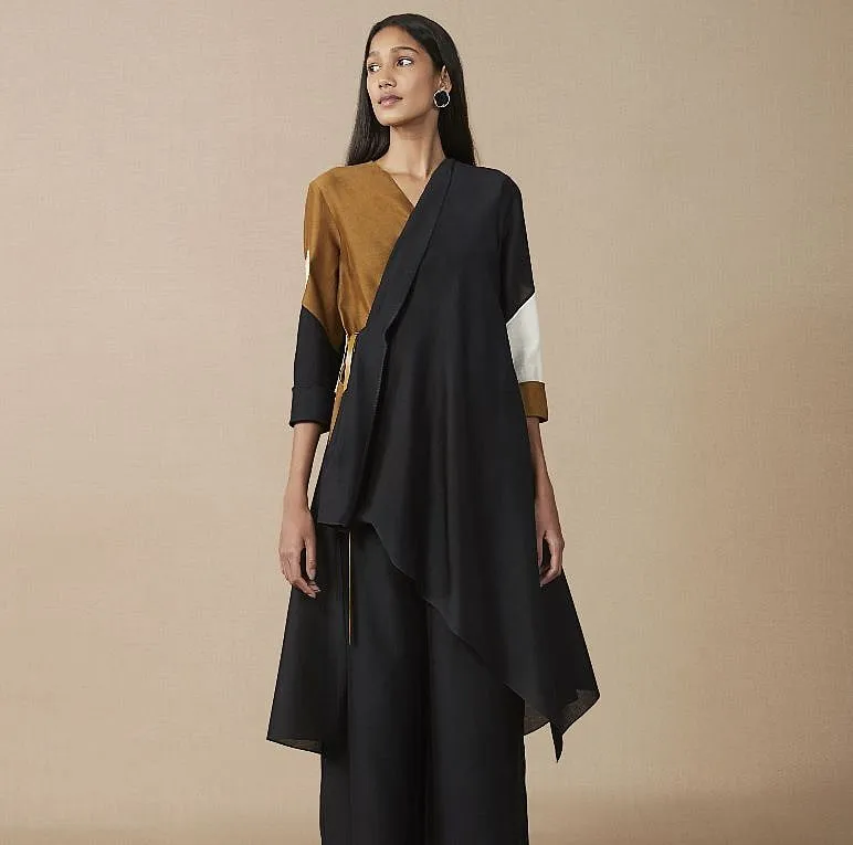 The Naaila tunic set is delicately embroidered in a silken chanderi 