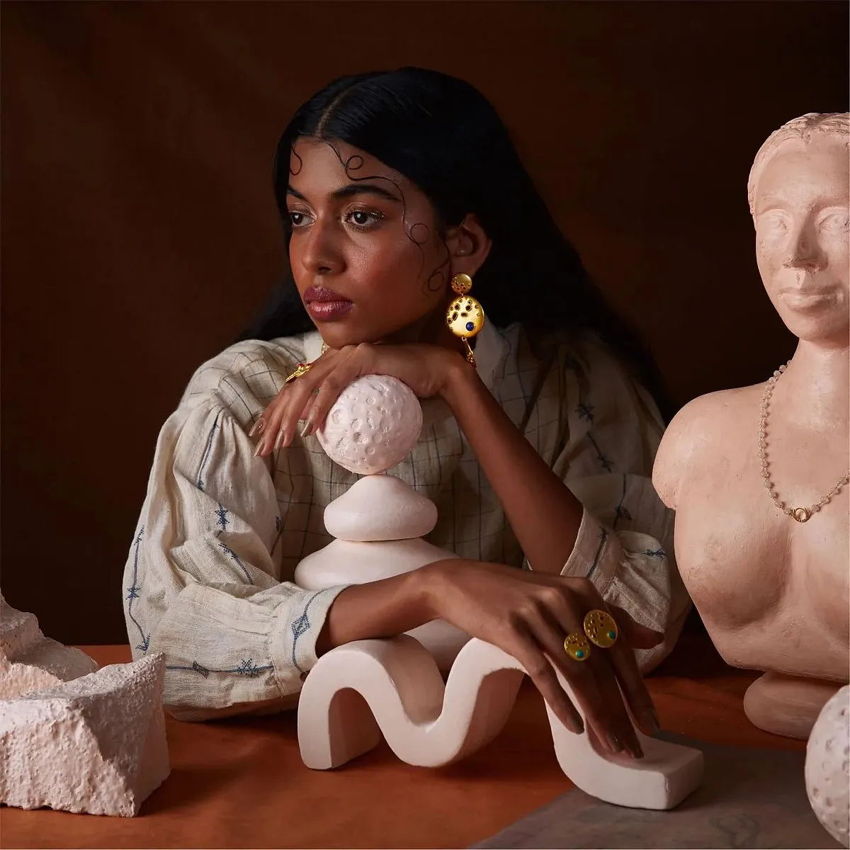 GaïaTree:Founded by Saiyam Sethia and Apoorva Agarwal in 2020, GaïaTree encapsulates the idea of being spunky, playful and free-spirited in their designs. The Mumbai-based label takes inspiration from the city’s Art Deco architecture to create one-of-a-kind pieces of jewellery, such as their Art Deco cityscape mismatched earrings. Created in 18-carat gold-plated brass, each piece of jewellery is adorned with natural-coloured stones such as turquoise, coral and lapis, each unique enough to make a statement of your own.Where to buy: Gaiatreelabel.com 