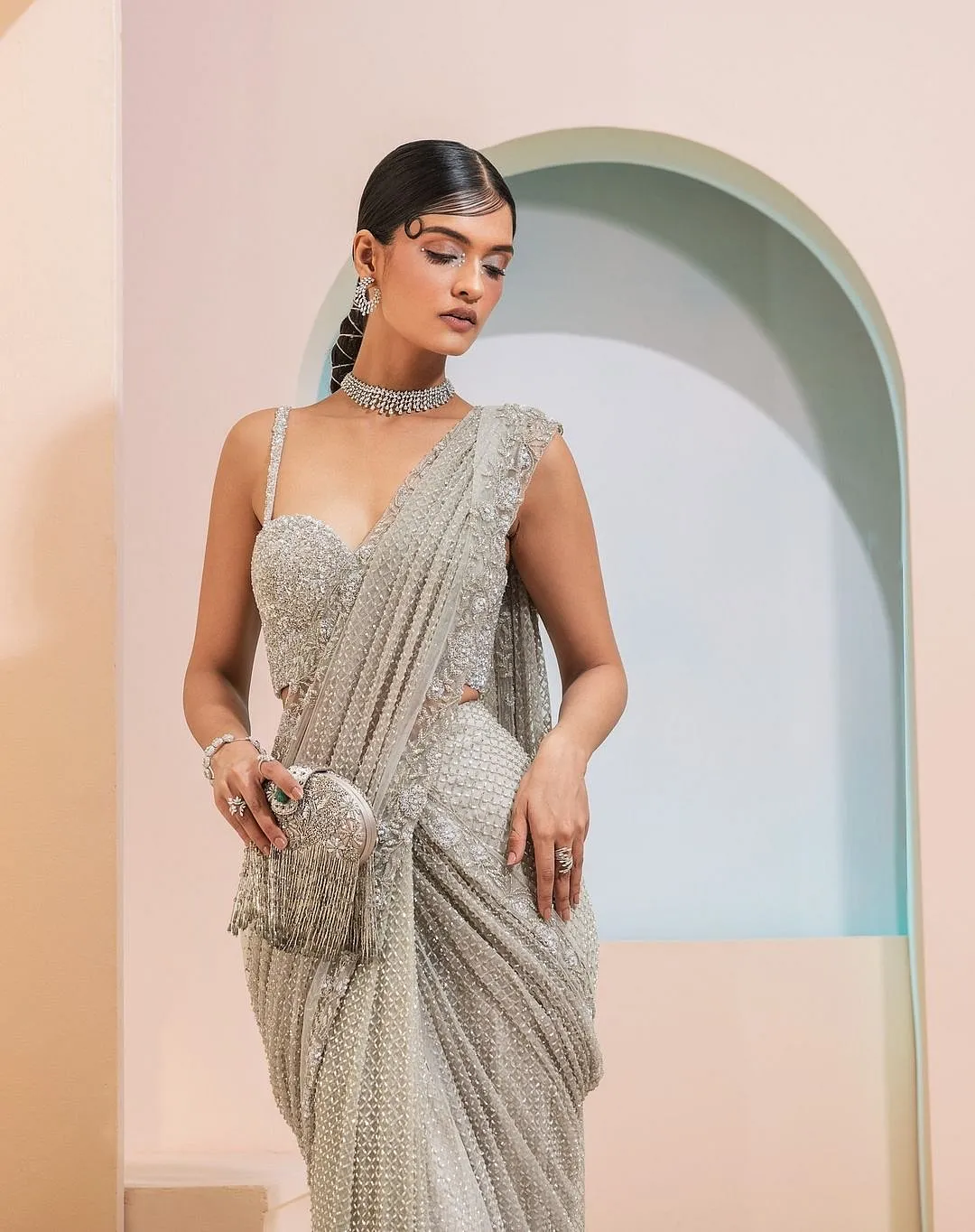 Esha Sethi Thirani You don’t have to take the inherently traditional route when it comes to your Diwali outfit, especially if the event at hand is a glamorous evening affair. For such scenarios, Kolkata-based designer Esha Sethi Thirani, who specialises in high-octane fusion wear, has several options. Choose from hybrid saris, shararas paired with peplum tops, lehengas that befriend corsets and other East-meets-West styles, all sprinkled with a whole lot of sparkle. Eshasethithirani.com  