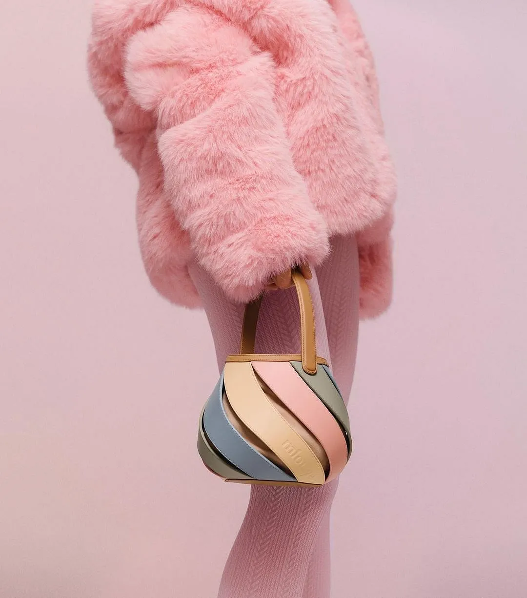 MlouyeMlouye’s founder and creative director Meb Rure draws from her career as an industrial designer to create flexible bags that have a futuristic look-and-feel. Other than their ability to almost instantly lift any outfit, the Istanbul-based brand’s designs are loved for two key reasons: Firstly, they can multitask–with a few simple adjustments, a top-handle bag can be turned into a backpack, or a clutch can be converted into a convenient crossbody and secondly, many of them, although sleek or small in size, come with compartments that can accommodate most of your everyday essentials with ease. Mlouye.com 