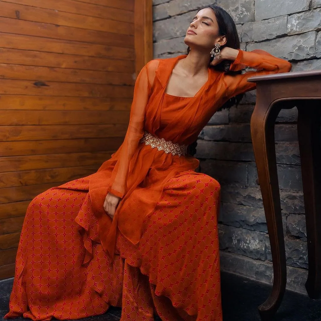 Poonam Mittal If you don’t want to be weighed down by heavy embroidery and prefer lighter, more movement-friendly looks, turn to Ahmedabad-based designer Poonam Mittal. Her collections–which often draw inspiration from nature–are brimming with breezy, breathable silhouettes and fresh floral prints. Instagram.com/poonammittalofficial 