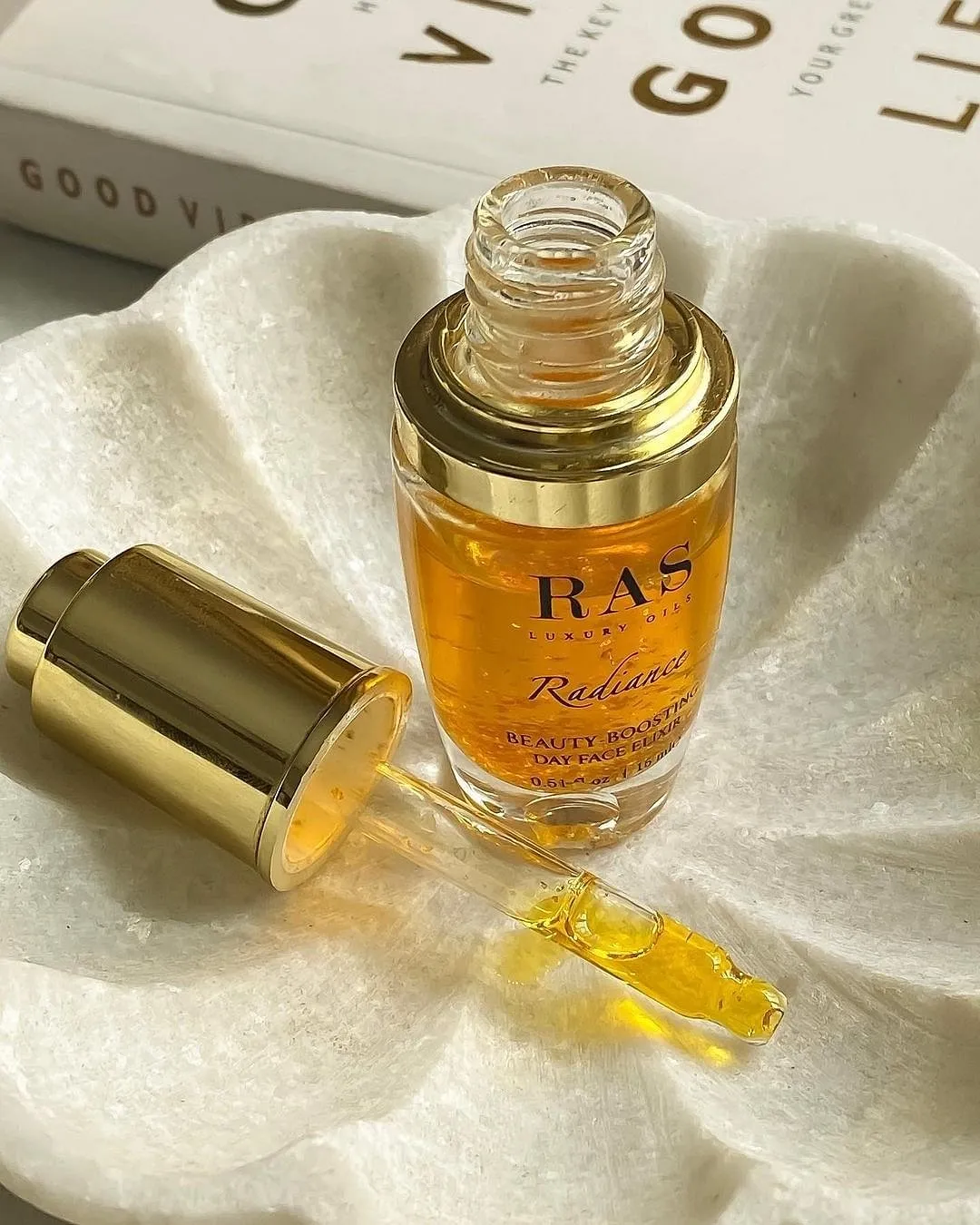 The 24K Gold Radiance Face Elixir from RAS Luxury Oils is a powerhouse that lends moisture, glow and radiance, leaving the skin luminous and healthy. The rich oil complex combined with 24k gold flakes is to be thanked 