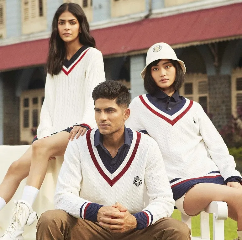 The collection includes essential sartorial pieces like retro-doused varsity jackets, crested sweatshirts, sweater vests, classic and cropped polos 