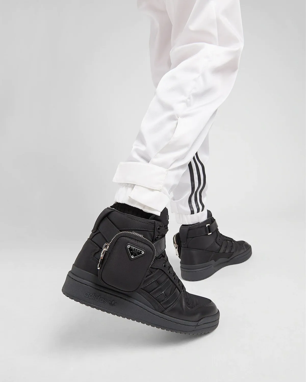 Prada x Adidas Re-Nylon:In 2019, Prada started focusing on sustainability by introducing their first Re-Nylon collection, which comprised a five-product assortment of bags and belts made from recycled nylon textiles. While previously Prada gave a minimal makeover to Adidas’ Superstar and Luna Rossa 21, this year, the duo brought a monochromatic variation of the sportswear brand’s Forum. Created with recycled plastic waste from oceans and fishing nets, the Prada x Adidas Re-Nylon shoes come in two colours of black and white with a detachable nylon pouch as an ode to Prada’s signature nylon bag.Where to buy: Prada.com 