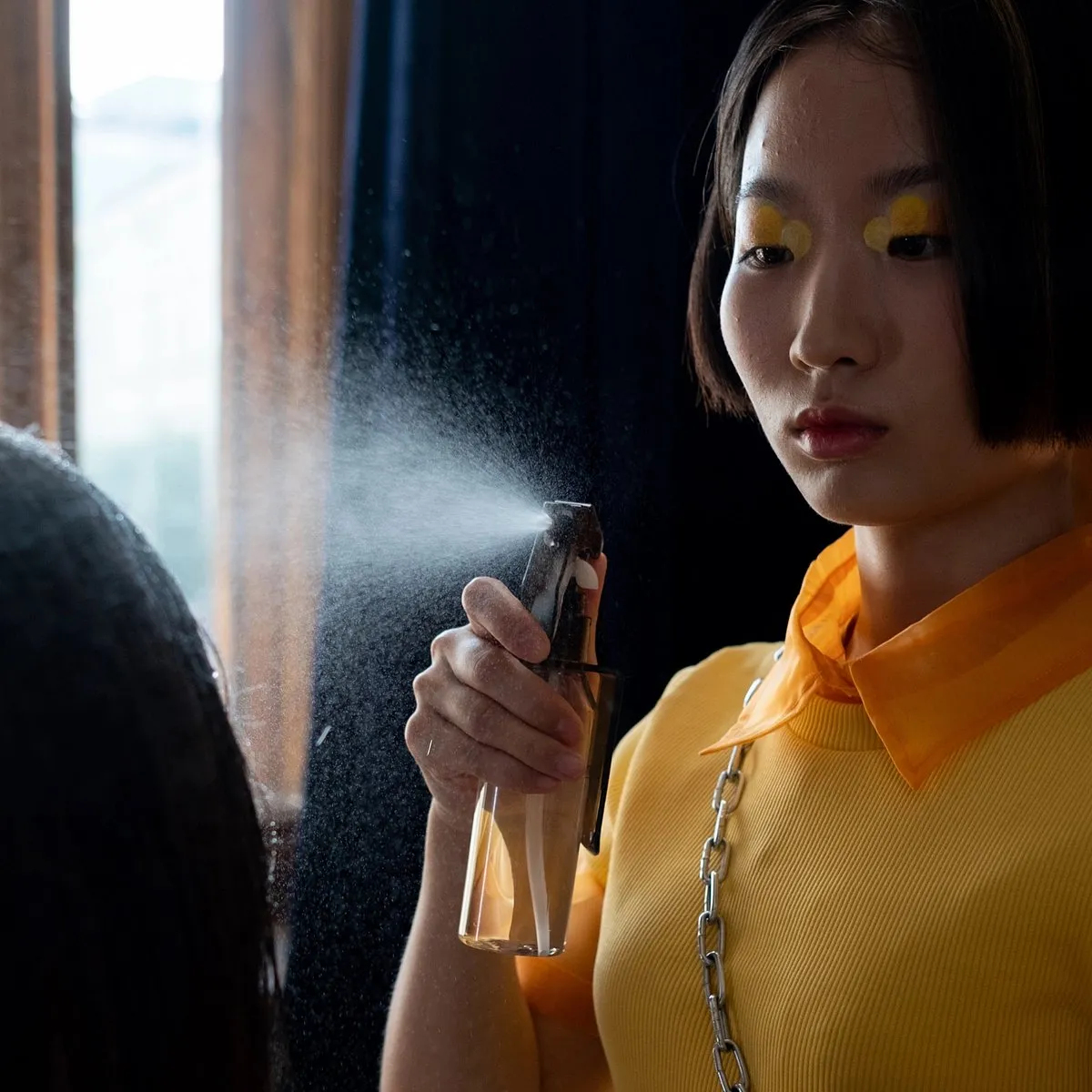 Instead of making hair sprays a part of your daily routine, you can indulge in hair washes at regular intervals, using the right shampoos and conditioners. Image: Pexels 