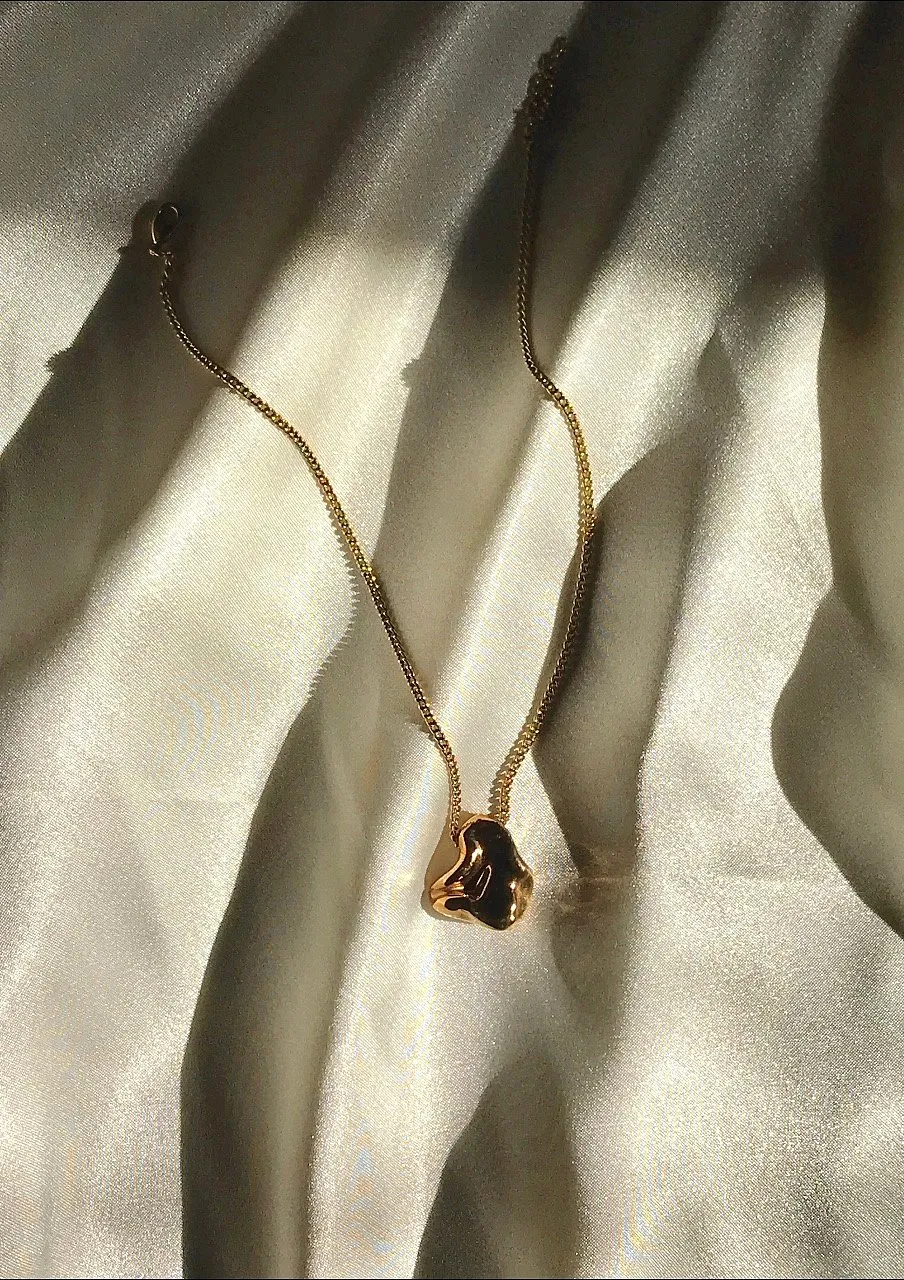 It's easy to get confused with metals. If it is gold-plated brass, it isn't solid gold and will tarnish with time. Image: Pexels 