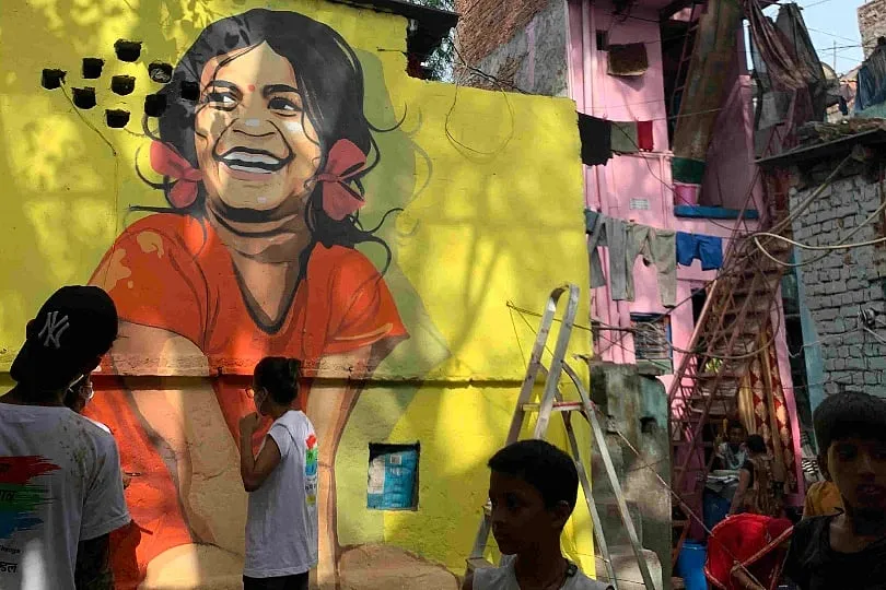 Anika Somaia's Open Canvas is a public art project that sees her work with communities in slums across New Delhi. Image: Open Canvas 