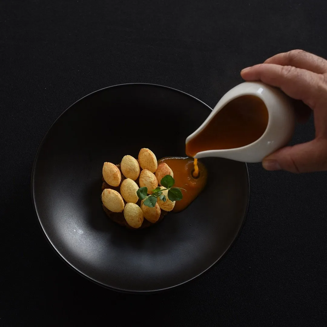 Indian Accent's Puri aloo with sweet pumpkin and pickle 