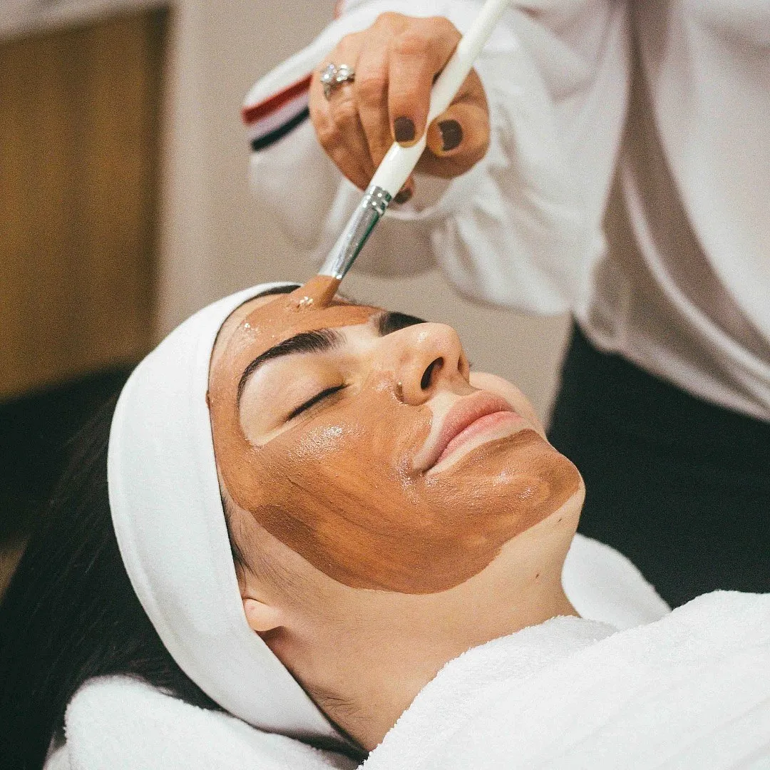 While salons employ therapists to execute the facials, clinics secure the services of certified dermatologists to perform treatments. Image: Unsplash 