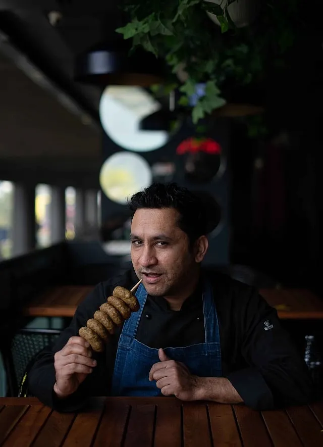 Pawan Bisht is the corporate chef of One8Commune (owned by Virat Kohli) 