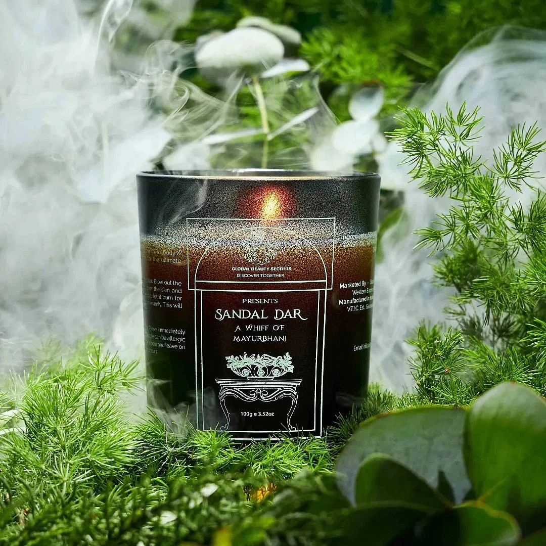 Sandal Dar, Global Beauty SecretsWhen a slew of hand-pressed oils and natural butters are paired with fragrant essential oils, the results are beneficial for both your senses and skin. This candle, from the brand’s Mayurbhanj range of products, bestows nourishment to the skin, thanks to the presence of cocoa butter, shea butter, sweet almond oil and vitamins, simultaneously calming your senses with a peculiar indie aroma, courtesy of pure sandalwood extract and lemongrass oil. Use the melted residue of the candle to massage the muscles of your arms, legs and back.Image: www.discovergbs.com 