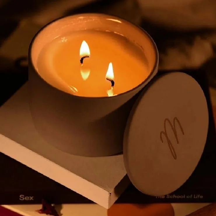 Spark Candle, MyMuseIn terms of its ingredients and packaging, this candle seems straight out of an apothecary. The ceramic packaging comprises a pure soy wax candle featuring naturally-derived essential oils like jasmine, ylang-ylang, patchouli, amber, vanilla, bergamot and mahogany. The clean, toxin-free product also sets the mood right, enhancing your bedroom time, quite positively. 