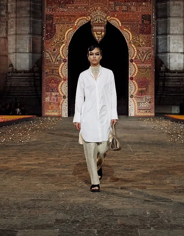 Crisp tunic shirts where paired with tailored trousers 