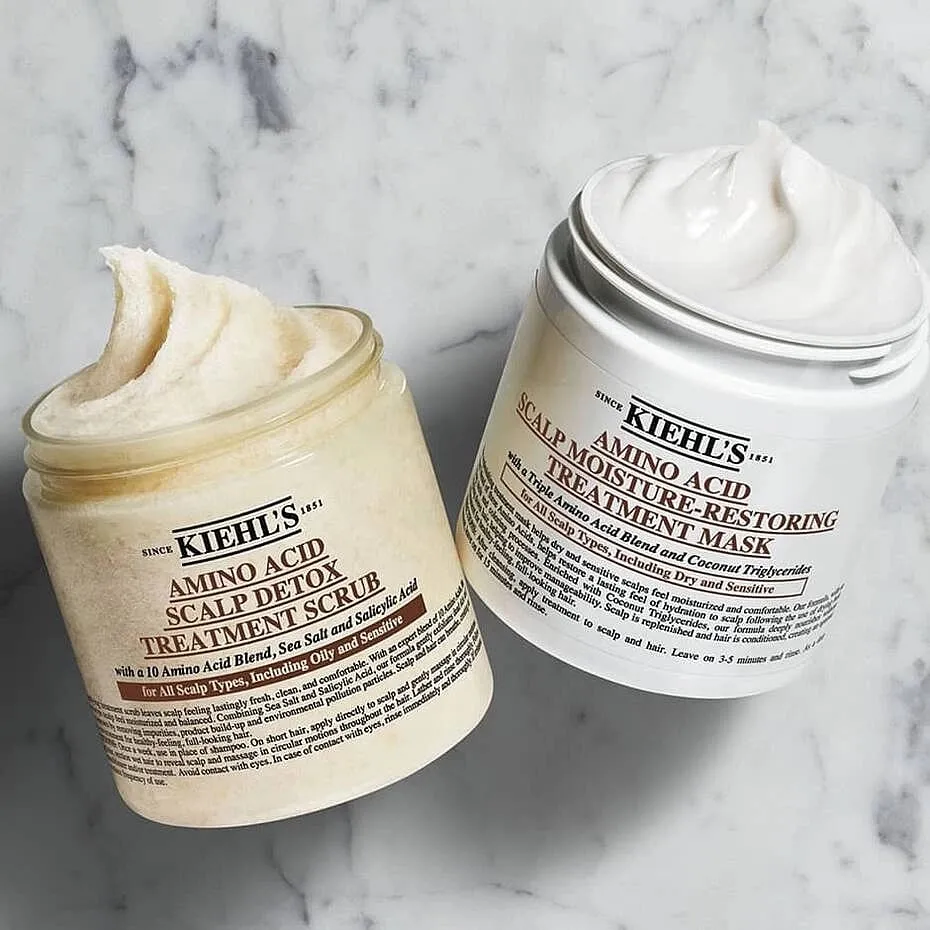 Amino Acid Scalp Moisture-Restoring Treatment Mask, Kiehl’sAmino acids can be much more advantageous for hair bond repair than you think, given that they are the building blocks of the proteins in your hair. This hair mask is equivalent to a potent treatment for dry and damaged hair as it boasts the combined forces of amino acids, coconut oil, hydrolysed soy and wheat protein, shea butter and glycerin. It can also be slathered on the scalp, making it a holistic remedy for a lifeless mane. Priced  at ₹2,600 approximatelyShop here 