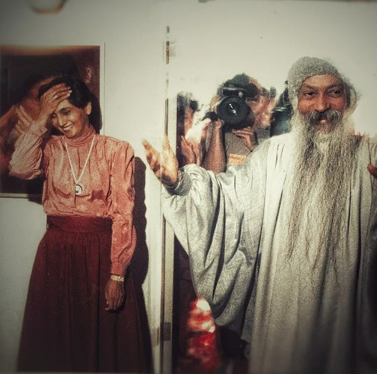 Ma Anand Sheela with Osho Rajneesh, in a still from Wild, Wild Country. Image: Ma Anand Sheela 