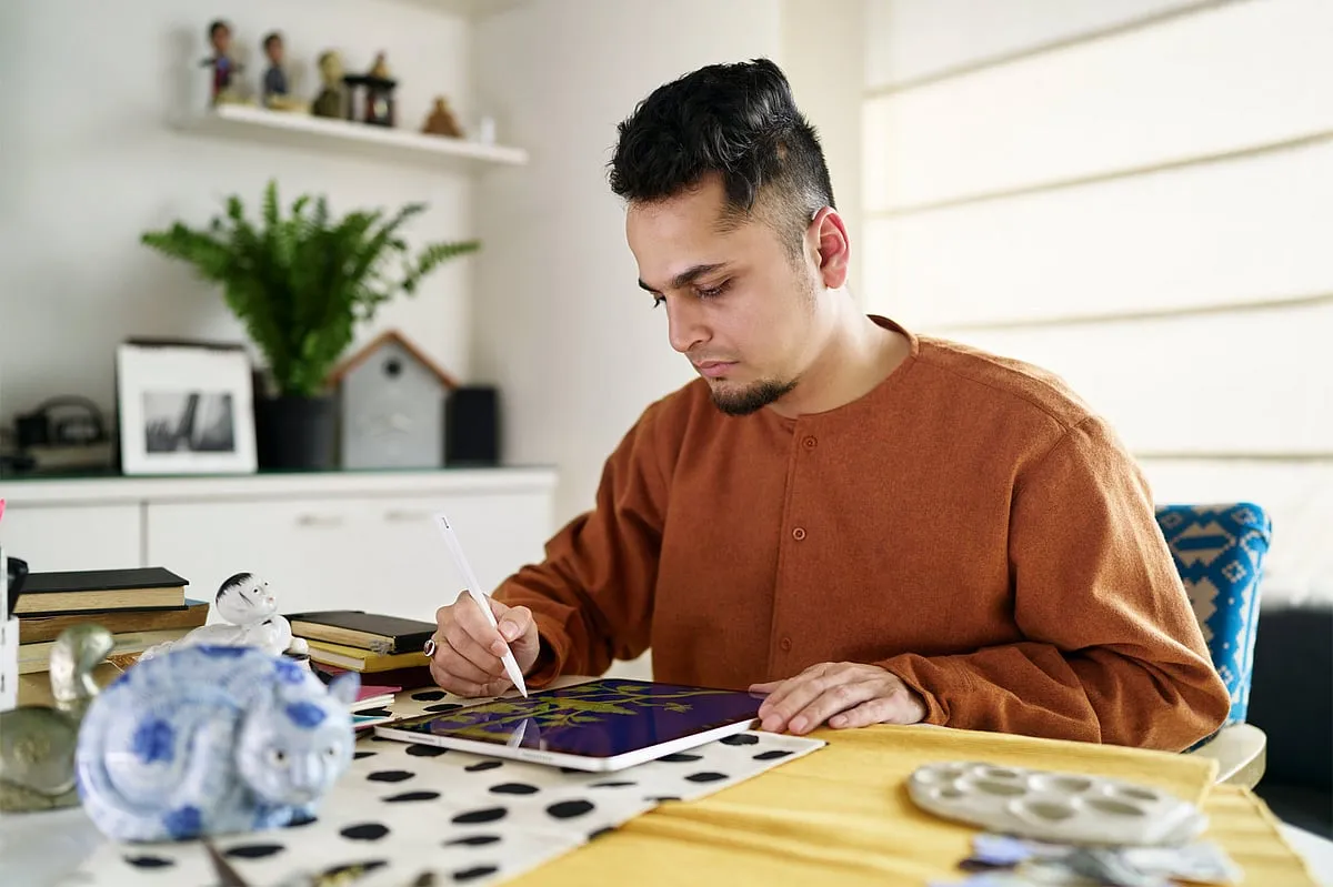 Digital artist and storyteller Gaurav Ogale turns nostalgia into art and makes his narratives leap off the page in motion by drawing frame by frame in Procreate, and then editing the video file on Adobe Premiere on a MacBook Pro, and layering in audio recordings taken on the iPhone 14 