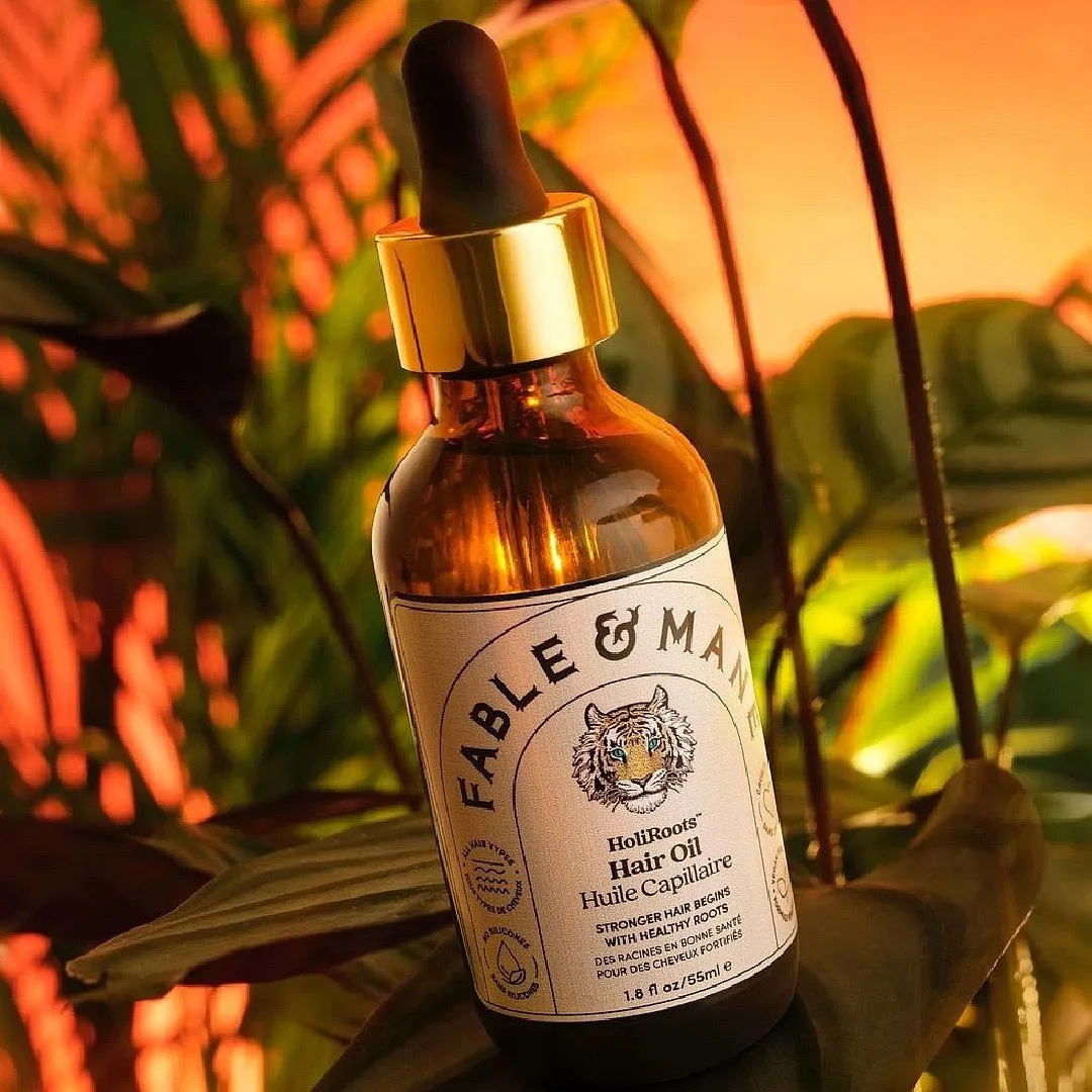 Holi Roots Hair Oil, Fable & ManeFable & Mane is reappraising the ancient, old-school ritual of oiling your hair by infusing potent Ayurveda-backed ingredients into a luxurious-feeling and pleasant-smelling oil. The hair oil is equivalent to a powerful solution to strengthen and nourish your hair, for it contains Ashwagandha, castor oil and Dashmool (a composition of ten plant roots in equal proportion) and a bunch of natural oils like grape seed, jojoba, olive and sesame seed oil. The lightweight texture doesn’t give your hair a flat look, while the fresh fragrance leaves you wanting more of it. If you’re someone with an overly oily scalp or acne-prone skin, leave the oil for no more than 30 minutes on the scalp; otherwise, it can be left overnight too.Image: Instagram.com/fabelandmanePrices start at ₹1,200Shop here 