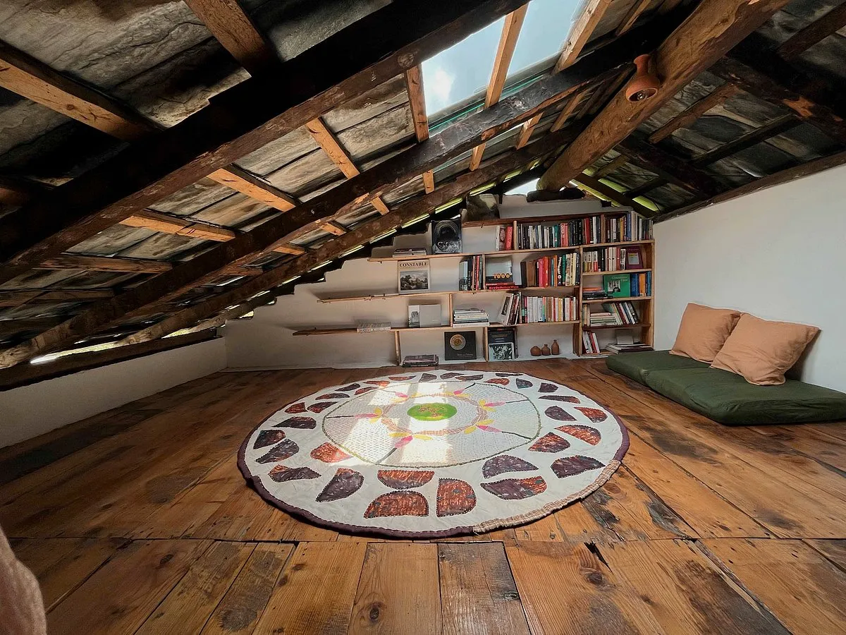 The Attic Library, Bir (Himachal Pradesh)When Delhi-based digital marketer Jyotsna moved to Bir, she found a traditional Himachali cottage to turn into a bed-and-breakfast space. “But it was only when we put the wooden ceiling in place, and I was left with an empty attic, that I knew that I was going to build a library here.” Jyotsna has since sifted through mountains of books in the Old Books Market in Delhi and even had some travel from her parental house to make the library what it is today. True to its name, the attic, with a sunroof above and a rug handwoven by a local artisan below, houses a wall-to-wall bookshelf for guests to enjoy. 
