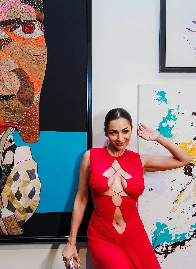 Malaika Arora Khan in front of artwork by 'alchemist' Viraj Khanna 