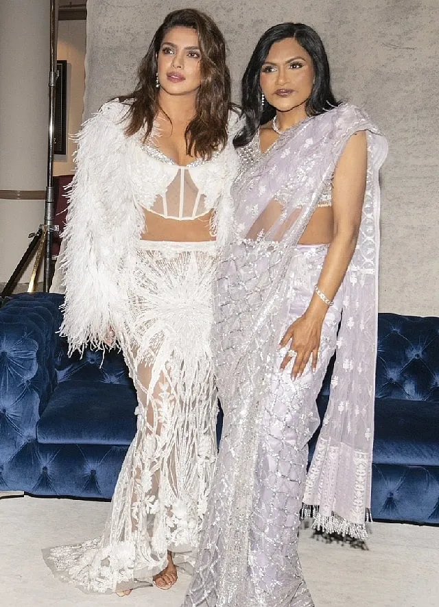 Priyanka Chopra Jonas, in a Falguni & Shane Peacock ensemble, with Mindy Kaling.  
