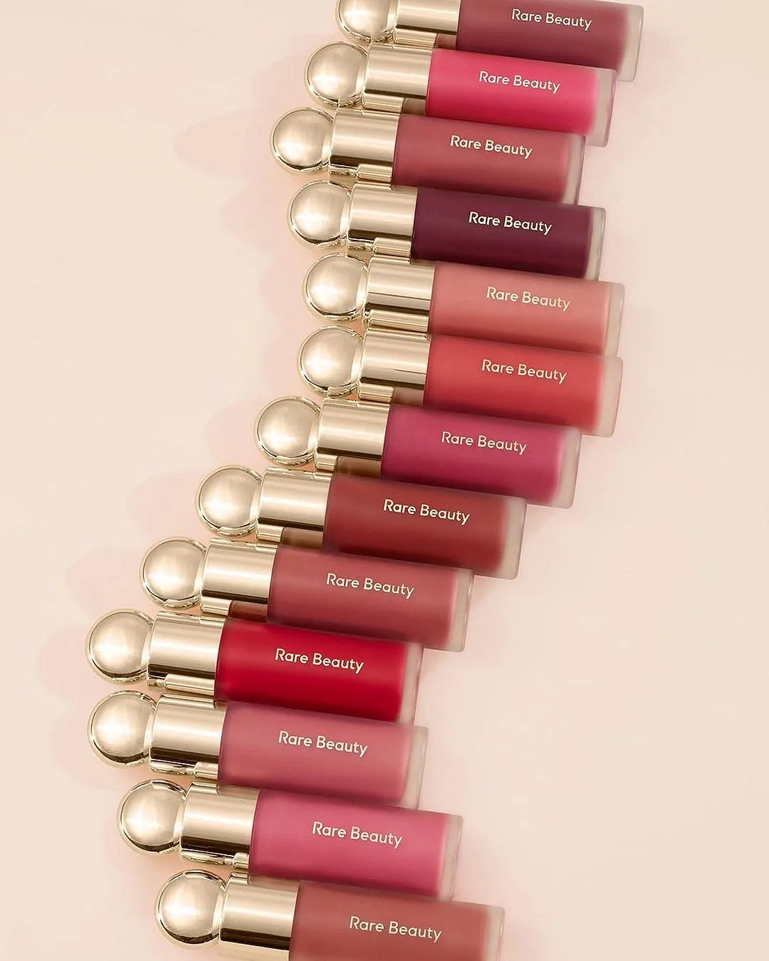 Soft Pinch Liquid Blush, Rare BeautyThis product easily passes as one of the brand’s best-selling ones, for it makes blush application seamless yet impactful. The perfectly rounded doe foot applicator allows for a generous round stamp, which is quite a good quantity to flush up your cheeks. Available in over ten shades, with a dewy and radiant finish, these blushes contain sunflower seed oil and gardenia and white water lily extract, this formula also ensures your cheeks are happy inside out. Priced at ₹1,900 approximatelyShop hereImage: Instagram.com/rarebeauty 