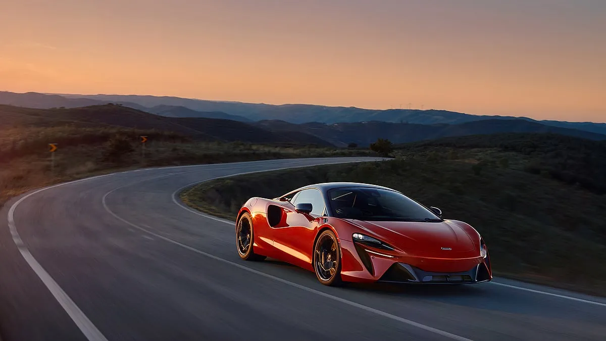 McLaren ArturaLast year, McLaren started its operations in India, and has now  expanded its line-up to include the Artura. The Artura is an exciting addition as it marks McLaren's debut in series production hybrid supercars. The McLaren’s Artura belonging to the next generation is one made from the all-new McLaren Carbon Fibre Lightweight Architecture (MCLA). The car contributes to a uniquely intense driving experience from the rear suspension to the advanced electronic-differential. This supercar’s ultra-light engineering brings blistering electrified power, sublime agility and engagement unlike any other vehicle in its league. INR 5.1 cr (ex showroom) 