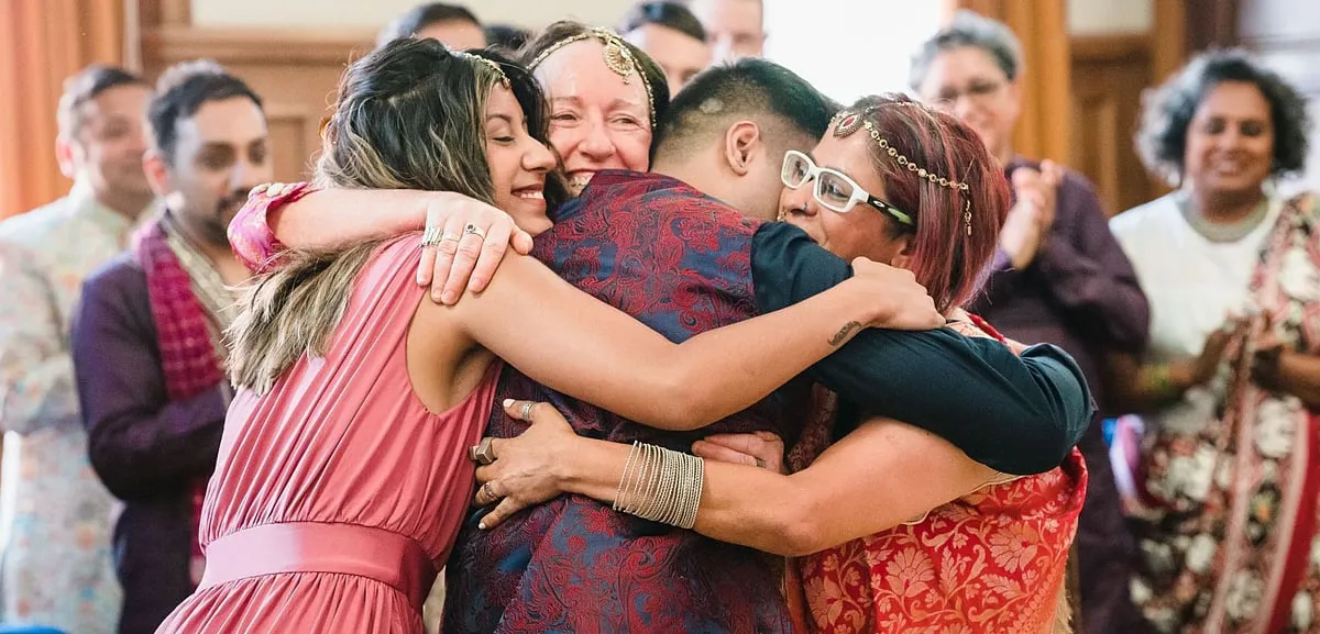 A family huddle at D'Silva and Fenton's wedding, after the former spent seven years in a heterosexual marriage. Image: Instagram.com/totallyoutnow 