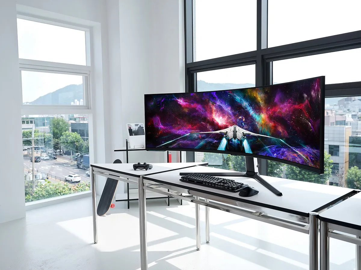 Samsung Odyssey Neo G9Samsung's 57-inch Odyssey Neo G9, its massive gaming monitor that's like having two 32-inch 4K displays sat next to each other. In 2023, Samsung is now offering 57 inches of curved Mini LED display with a refresh rate of 240Hz, a peak brightness of 1000 nits (VESA DisplayHDR 1000 certified, 420 nits typical), and a total resolution of 7,680 x 2,160. That translates to a wildly ultra-wide 32:9 aspect ratio. For multitasking, Samsung has equipped the 57-inch Odyssey Neo G9 with picture-in-picture and picture-by-picture display modes, allowing you to view content from multiple inputs simultaneously. The monitor is equipped with one DisplayPort 2.1 port, as well as three HDMI 2.1 ports. There's also a USB hub included for good measure, though Samsung's press release doesn't offer details on exactly how many ports that gets you. The monitor supports AMD's FreeSync Premium Pro variable refresh rate tech.Price: ₹2,25,000 