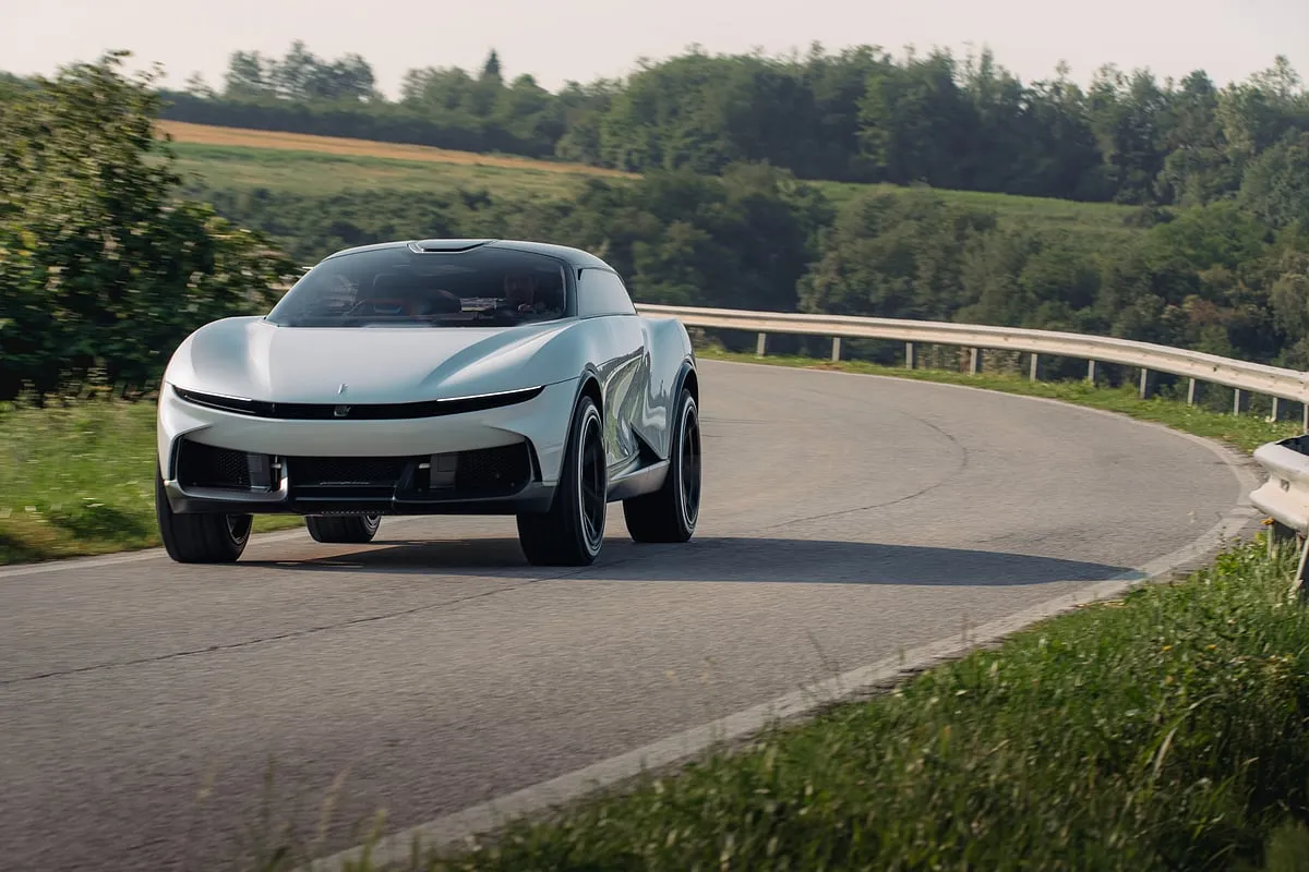 Pininfarina PURA Vision conceptThe Pura Vision is an impressive electric Luxury Utility Vehicle that boasts a stunning design. It blends classic elegance with intricate details, creating a look that exudes confidence. Notable features include its slim glass windows and three-opening doors that allow for easy entry to the luxurious interior. The vehicle's solid proportions and impressive design elements showcase an ideal combination of form and function, lending a glimpse of its autonomous driving features. According to Paolo Dellachà, CEO of Automobili Pininfarina, the 